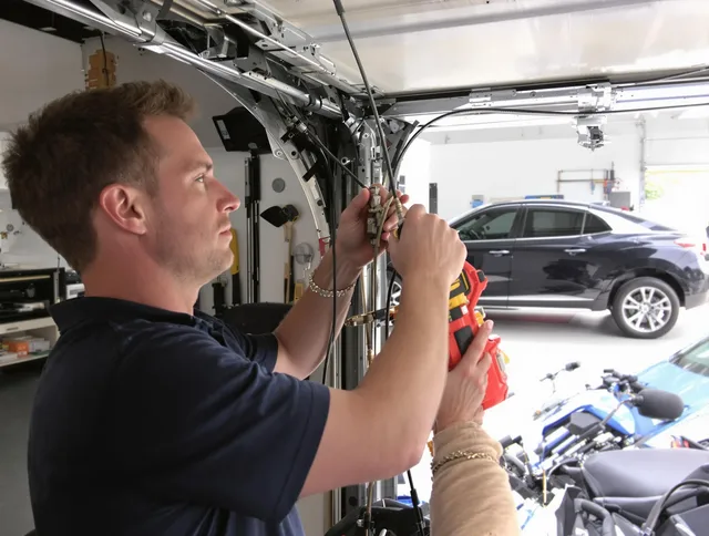 Rancho Palos Verdes Garage Door Repair safety certified technician performing cable replacement in Rancho Palos Verdes