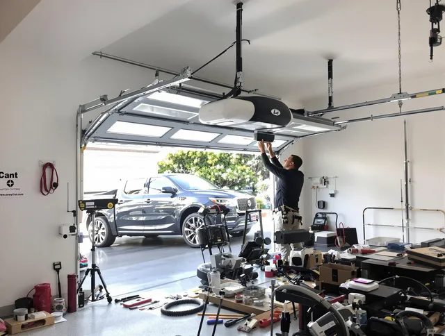 Rancho Palos Verdes Garage Door Repair specialist installing smart garage door opener system in Rancho Palos Verdes home