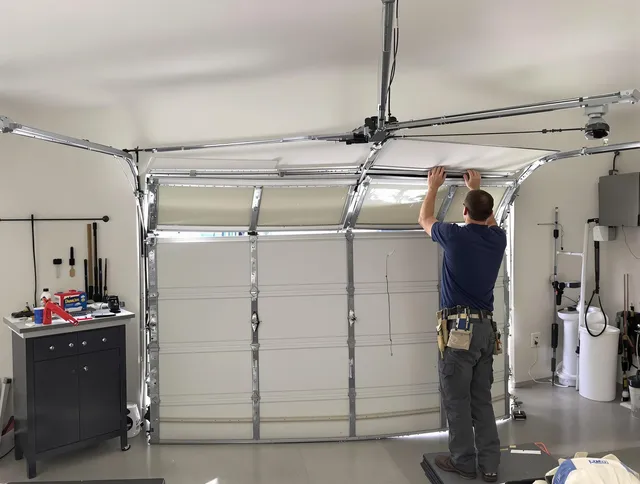 Rancho Palos Verdes Garage Door Repair specialist performing precise section replacement on Rancho Palos Verdes garage door